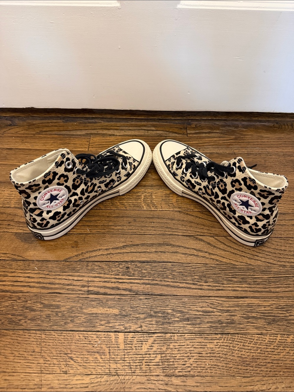 Converse Leopard Print High Top Sneakers in Black and Cream